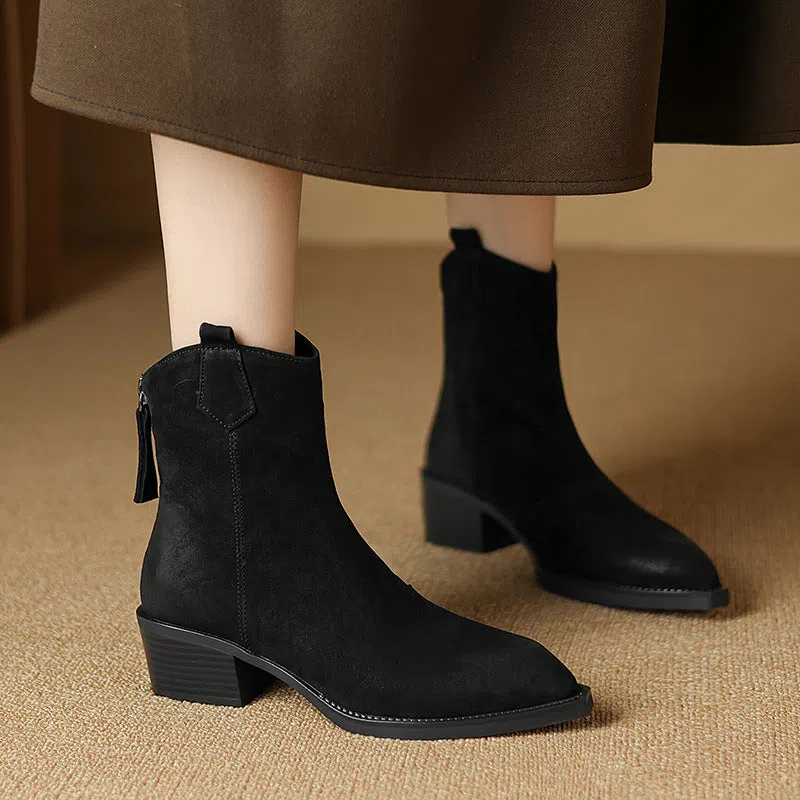 Women's retro Martin boots in light brown with pointed toe, chunky heel, and sewing thread detail