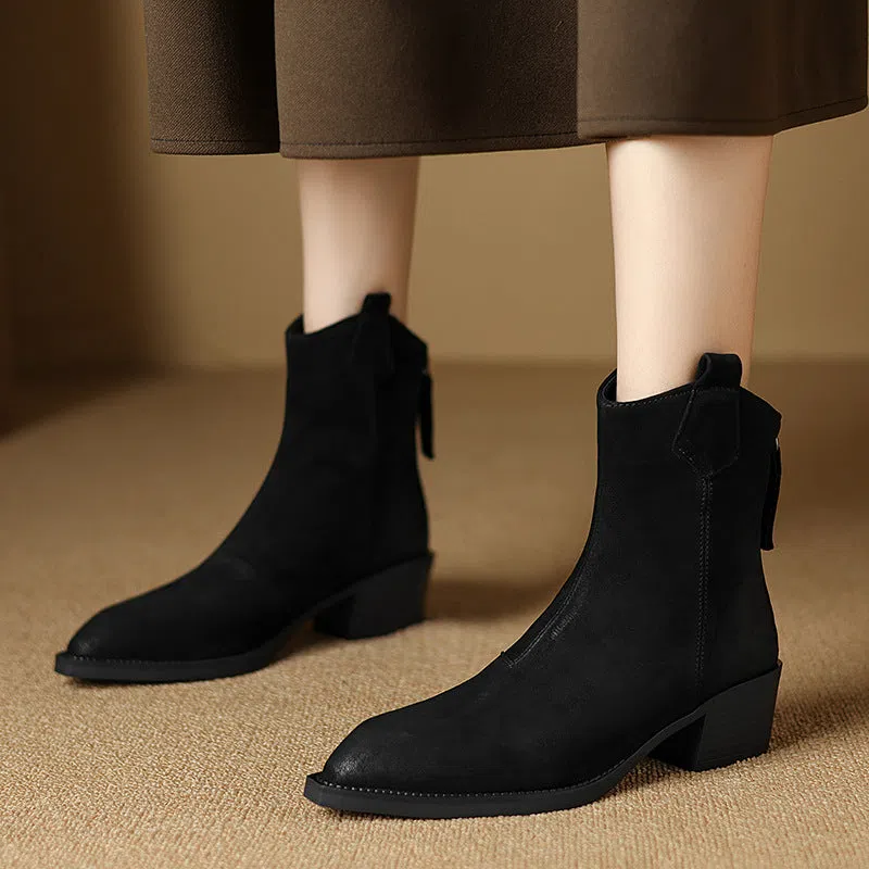 Women's retro Martin boots in light brown with pointed toe, chunky heel, and sewing thread detail
