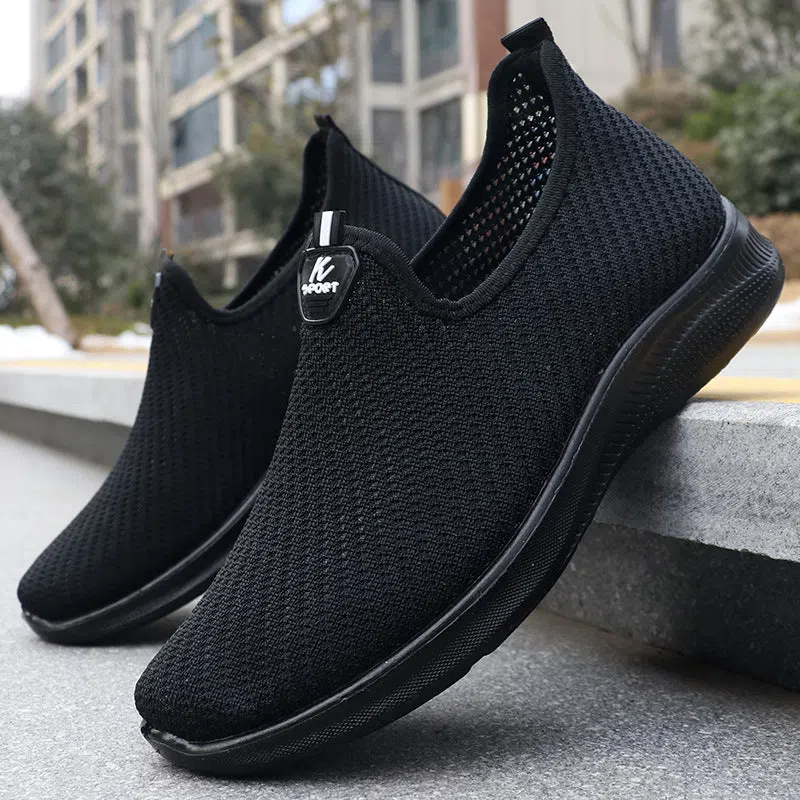 Spring men's breathable flyknit casual shoes in black with rubber sole – side view for hiking and daily wear