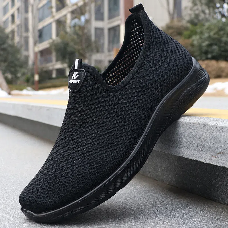 Spring men's breathable flyknit casual shoes in black with rubber sole – side view for hiking and daily wear