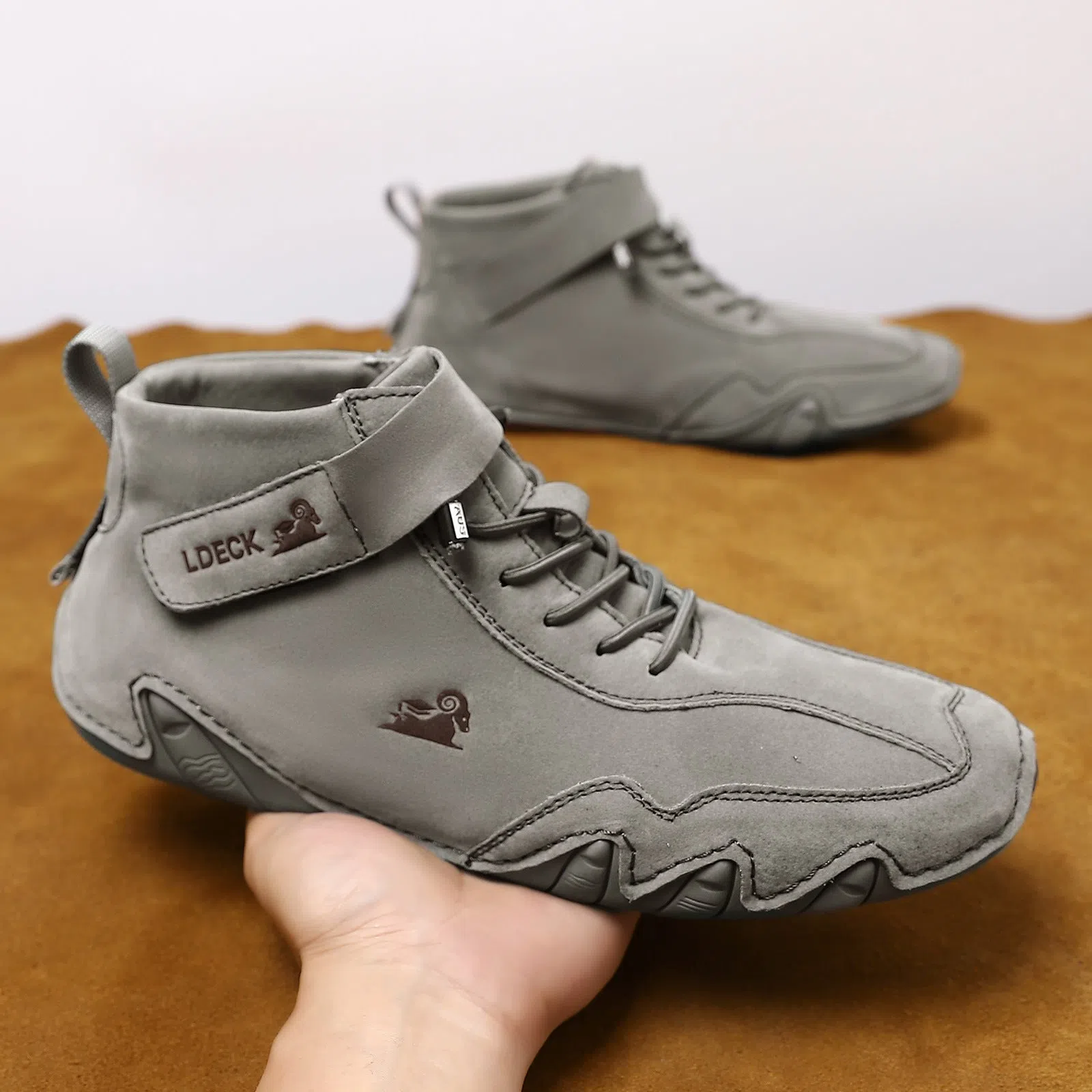 High-top octopus-style Martin boots in solid colour, microfiber upper with stitched seams, round toe, rubber sole