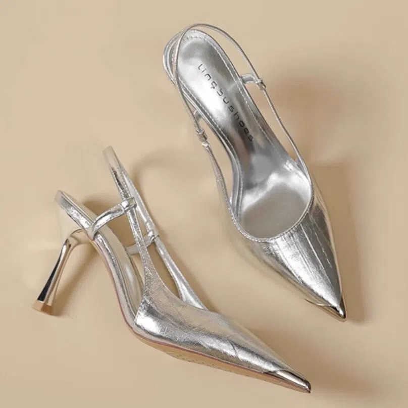 Women's pointed-toe colour-block stiletto heels in black with 7cm heel, PU upper, side view