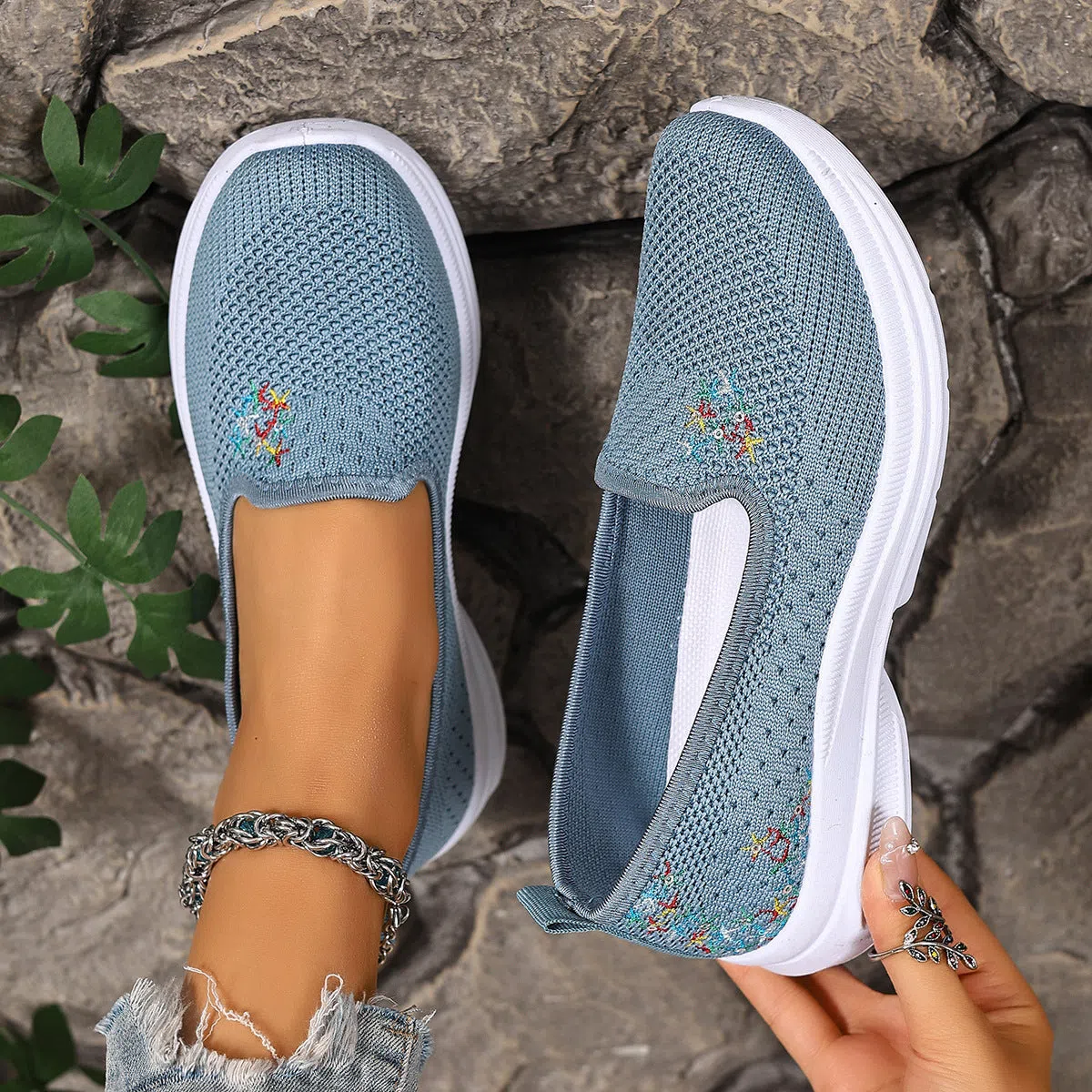 Women's mesh casual slip-on shoes in beige with round toe and low-cut shaft on a plain background