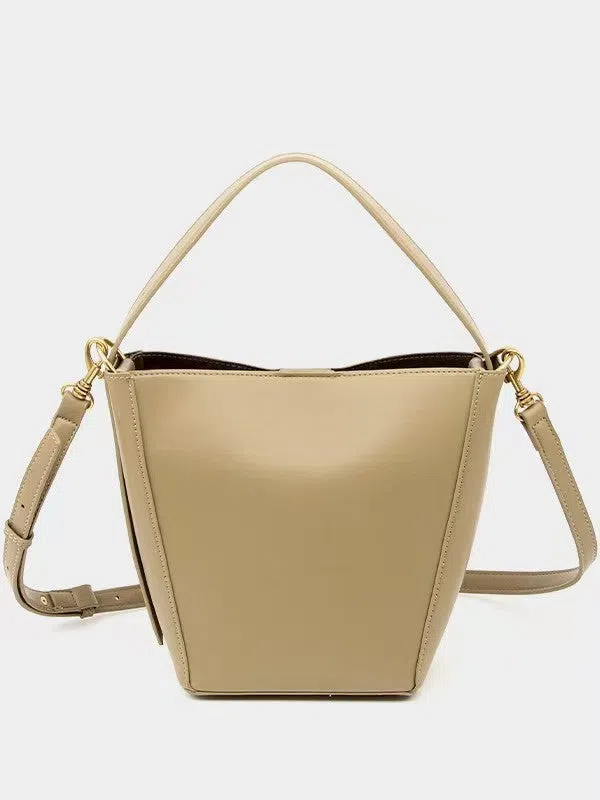 Urban minimalist crossbody shoulder bag in bucket style, PU material, solid colour, three-dimensional outer pocket, available in black, army green, and wine red