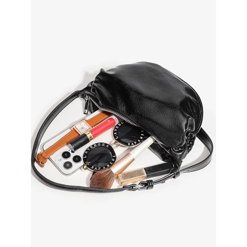 Black pleated shoulder bag with three-dimensional pocket in dumpling shape PU leather