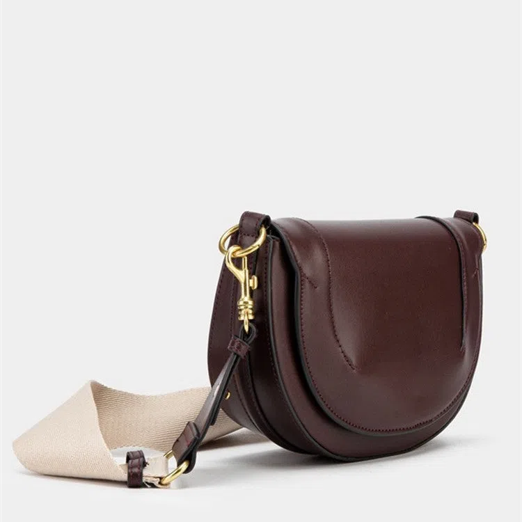 Medium PU saddle bag with magnetic clasp in black oval shape 16x24x8.5cm women's handbag