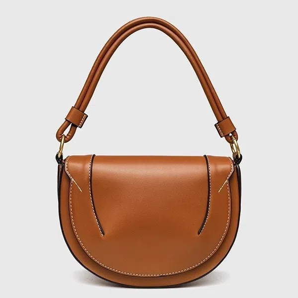 Medium PU saddle bag with magnetic clasp in black oval shape 16x24x8.5cm women's handbag