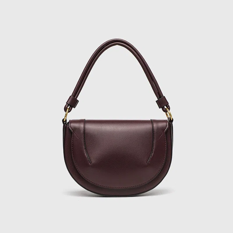 Medium PU saddle bag with magnetic clasp in black oval shape 16x24x8.5cm women's handbag