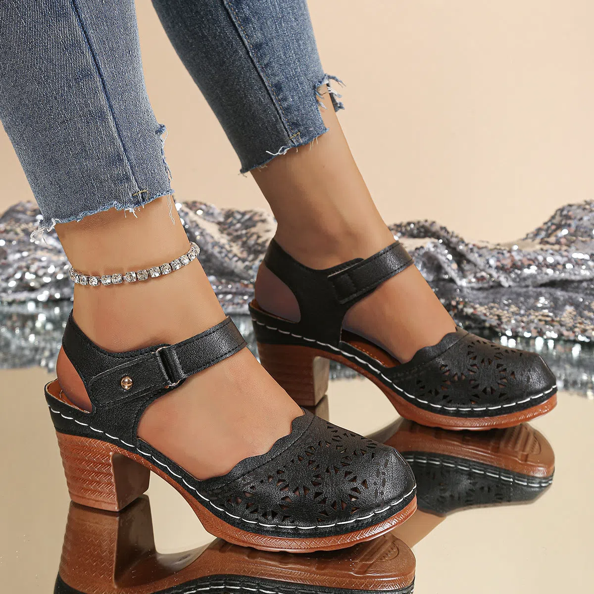 Women's hollow-out chunky-heel closed-toe sandals in black with Velcro strap and rubber outsole