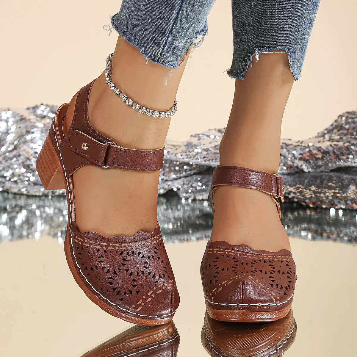 Women's hollow-out chunky-heel closed-toe sandals in black with Velcro strap and rubber outsole