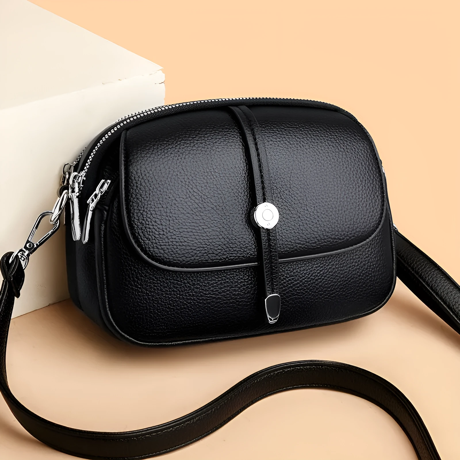 Soft PU women's crossbody shoulder bag in oval suitcase shape with sewing thread detail