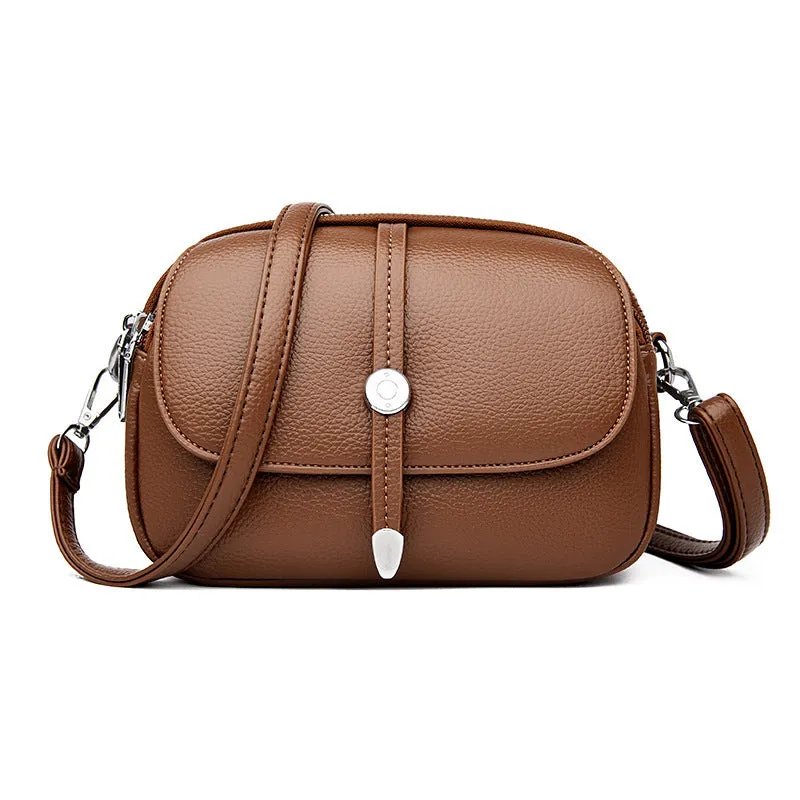 Soft PU women's crossbody shoulder bag in oval suitcase shape with sewing thread detail