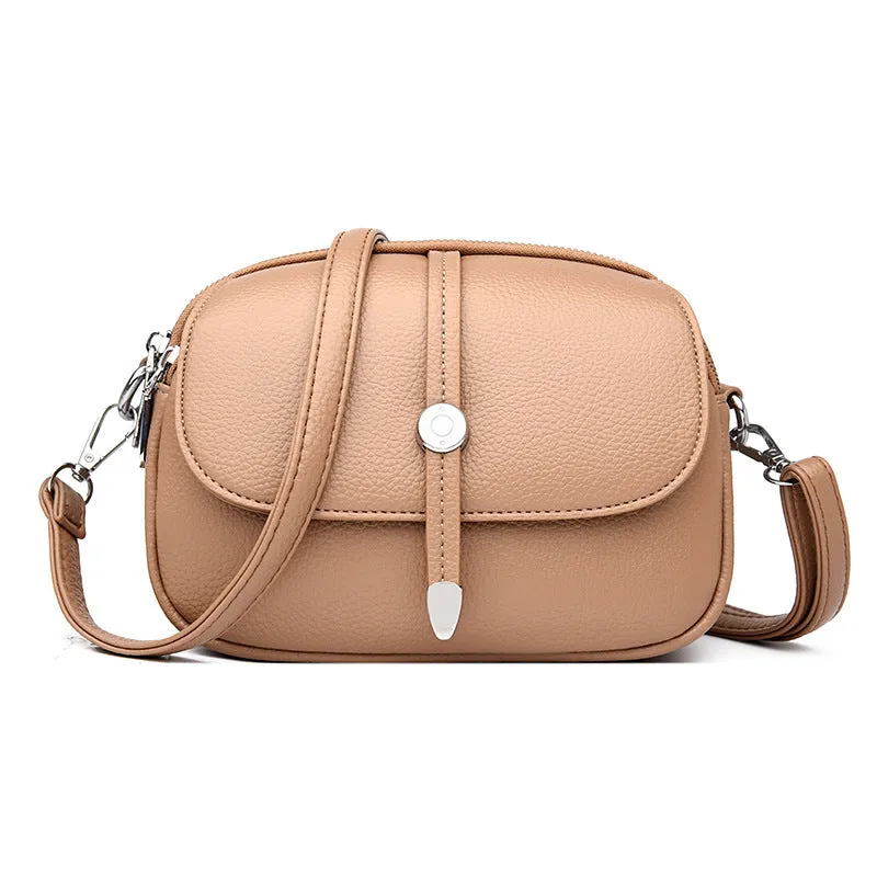 Soft PU women's crossbody shoulder bag in oval suitcase shape with sewing thread detail