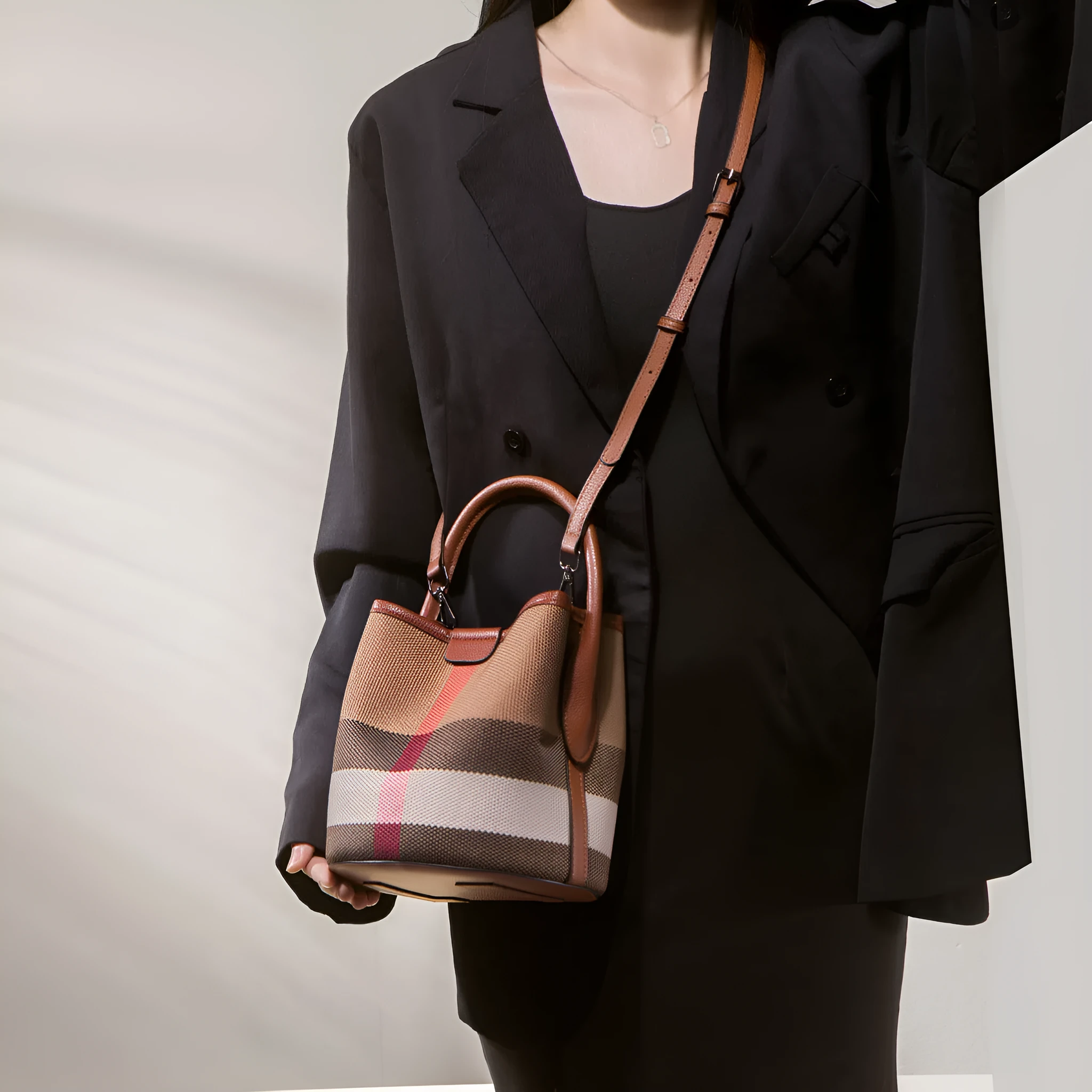 Plaid brown canvas bucket handbag set with large and small bags and single shoulder strap