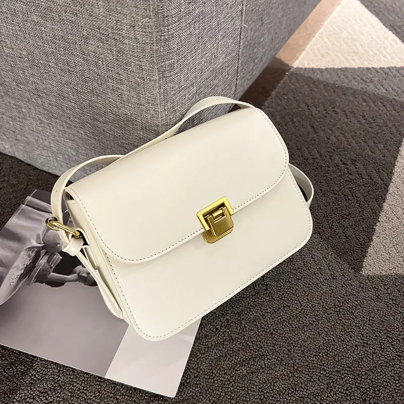 Women's soft PU leather cross-body bag in horizontal square shape showing texture detail and colour options