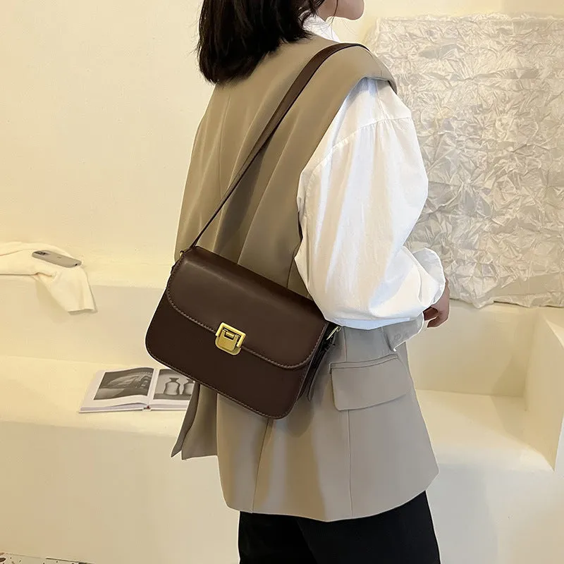 Women's soft PU leather cross-body bag in horizontal square shape showing texture detail and colour options
