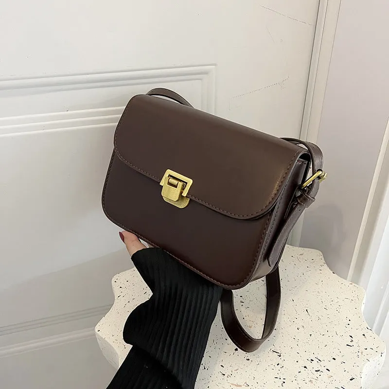 Women's soft PU leather cross-body bag in horizontal square shape showing texture detail and colour options