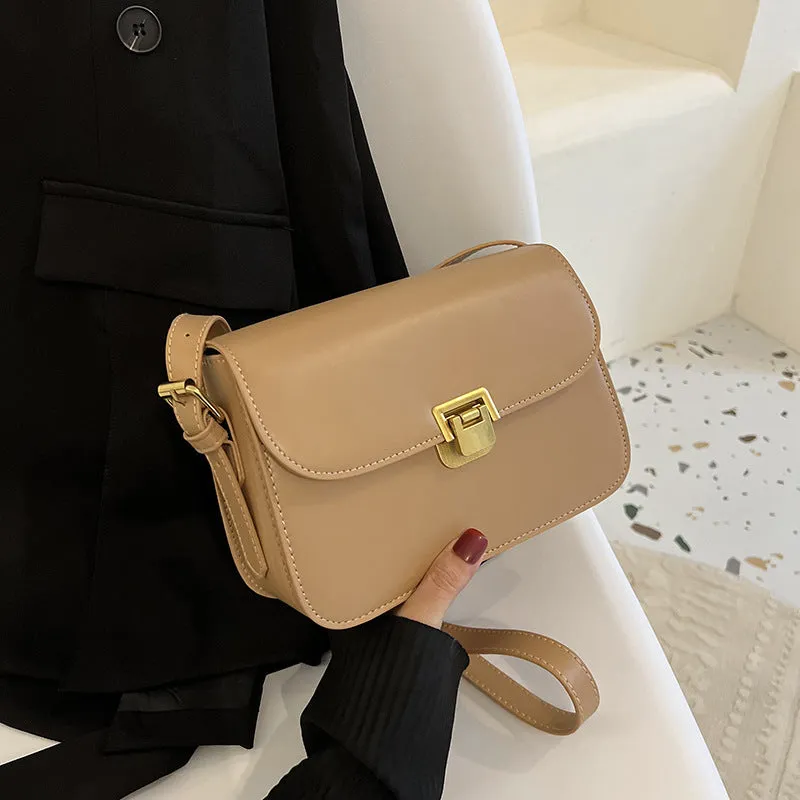 Women's soft PU leather cross-body bag in horizontal square shape showing texture detail and colour options