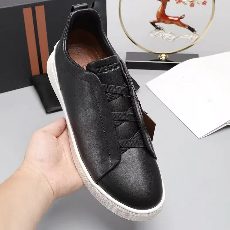 Men's genuine leather cross-strap casual shoes with cowhide upper, round toe, flat heel, and front laces