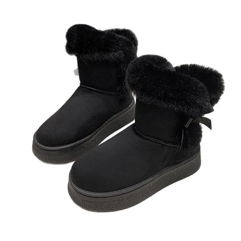 Women's mid-calf fleece-lined snow boots in brown with black rubber sole and bow tie detail