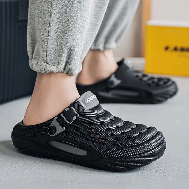 Men's solid colour EVA platform slippers with hollow-out design in black, shown from the side.