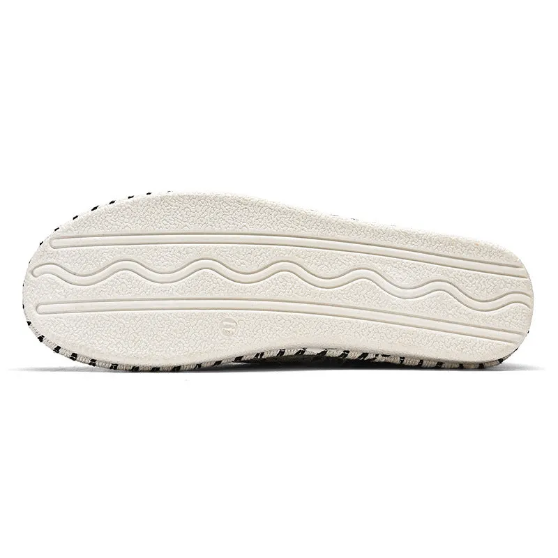 Men's beige and black cloth casual summer shoes with round toe on size chart.