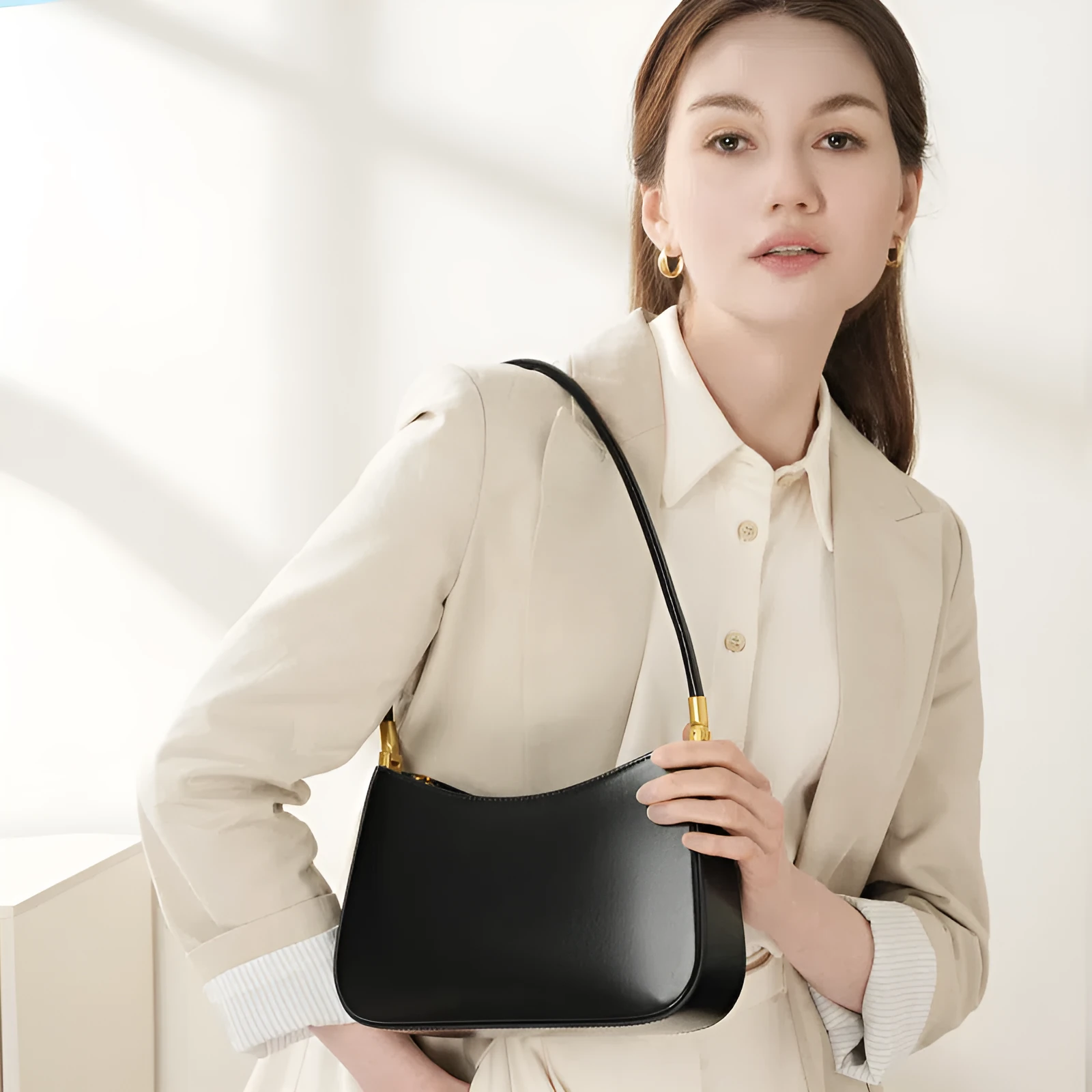 Women's casual French-style oval one-shoulder bag in cowhide leather, 25.5x6x14cm, available in black