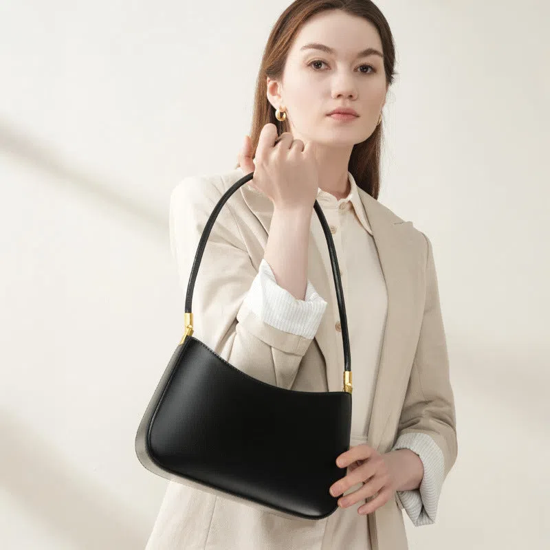 Women's casual French-style oval one-shoulder bag in cowhide leather, 25.5x6x14cm, available in black