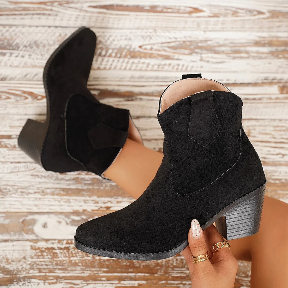 Women's suede ankle boots with a chunky heel and pointed toe in black