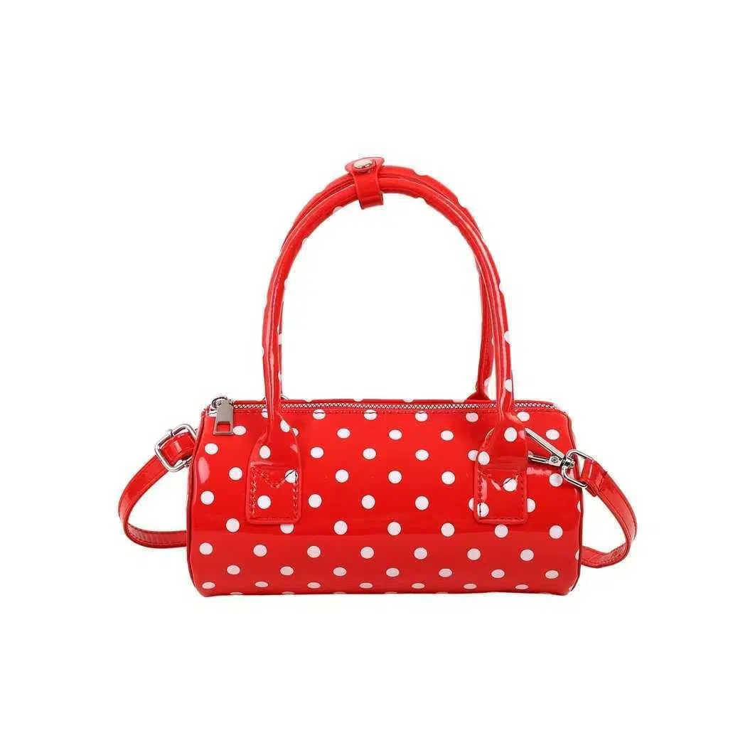 Korean-style cylindrical tote pillow bag in PU leather with stitched seams, black colour, single strap