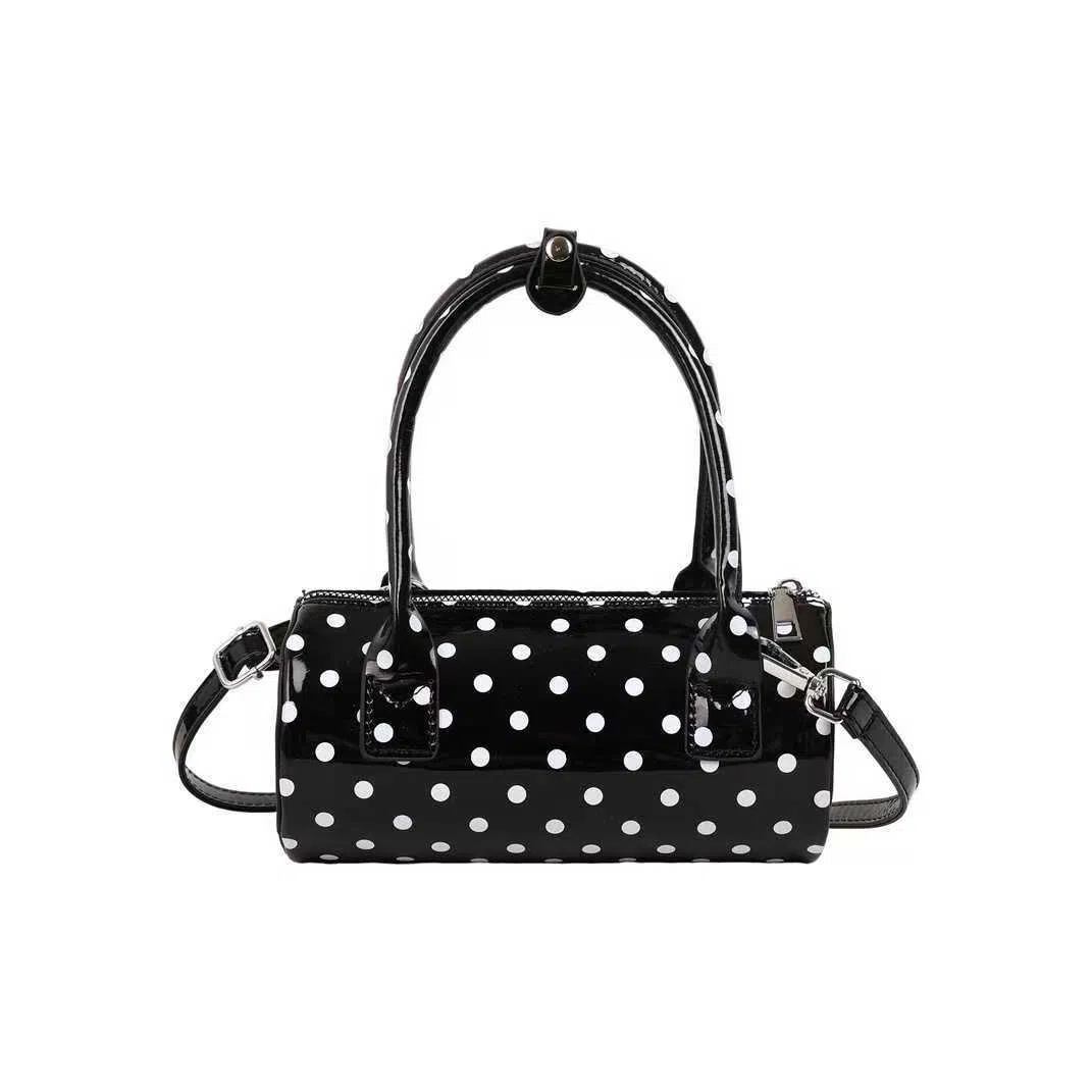 Korean-style cylindrical tote pillow bag in PU leather with stitched seams, black colour, single strap
