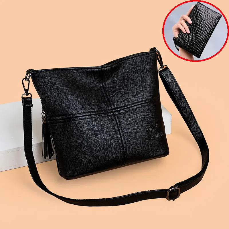 PU crossbody bag in red with stitching and tassels, horizontal shape, large capacity