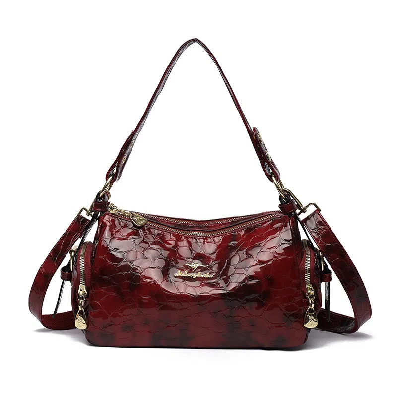 PU leather Boston pillow bag in khaki with stitched seams and stone pattern, double shoulder straps, internal pocket