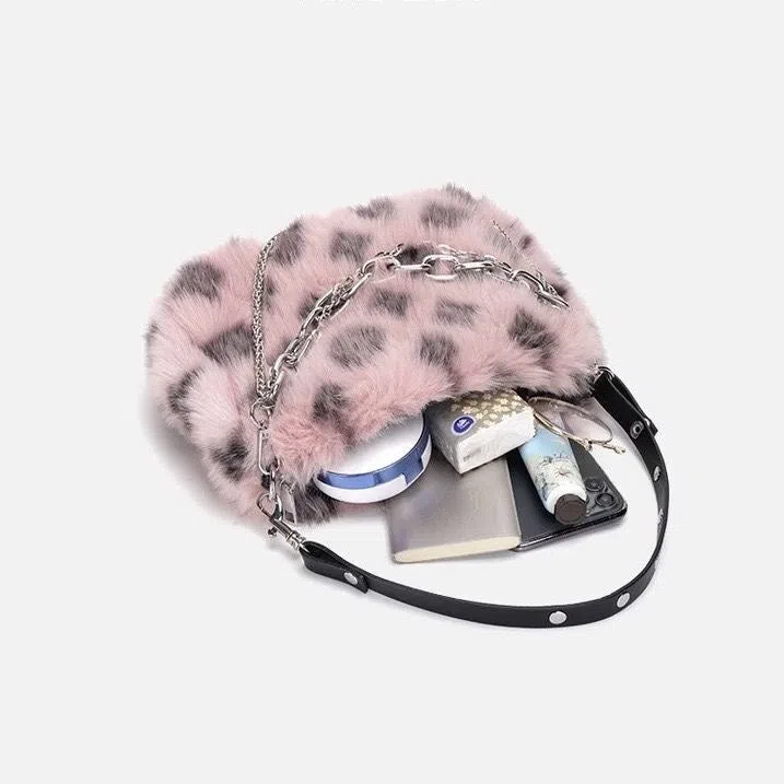 Plush luxury-style chain bag in apricot with leopard print and gold-tone chain, horizontal rectangular shape, soft texture.