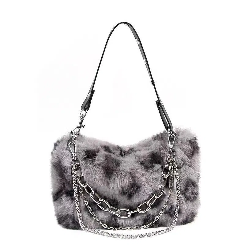 Plush luxury-style chain bag in apricot with leopard print and gold-tone chain, horizontal rectangular shape, soft texture.