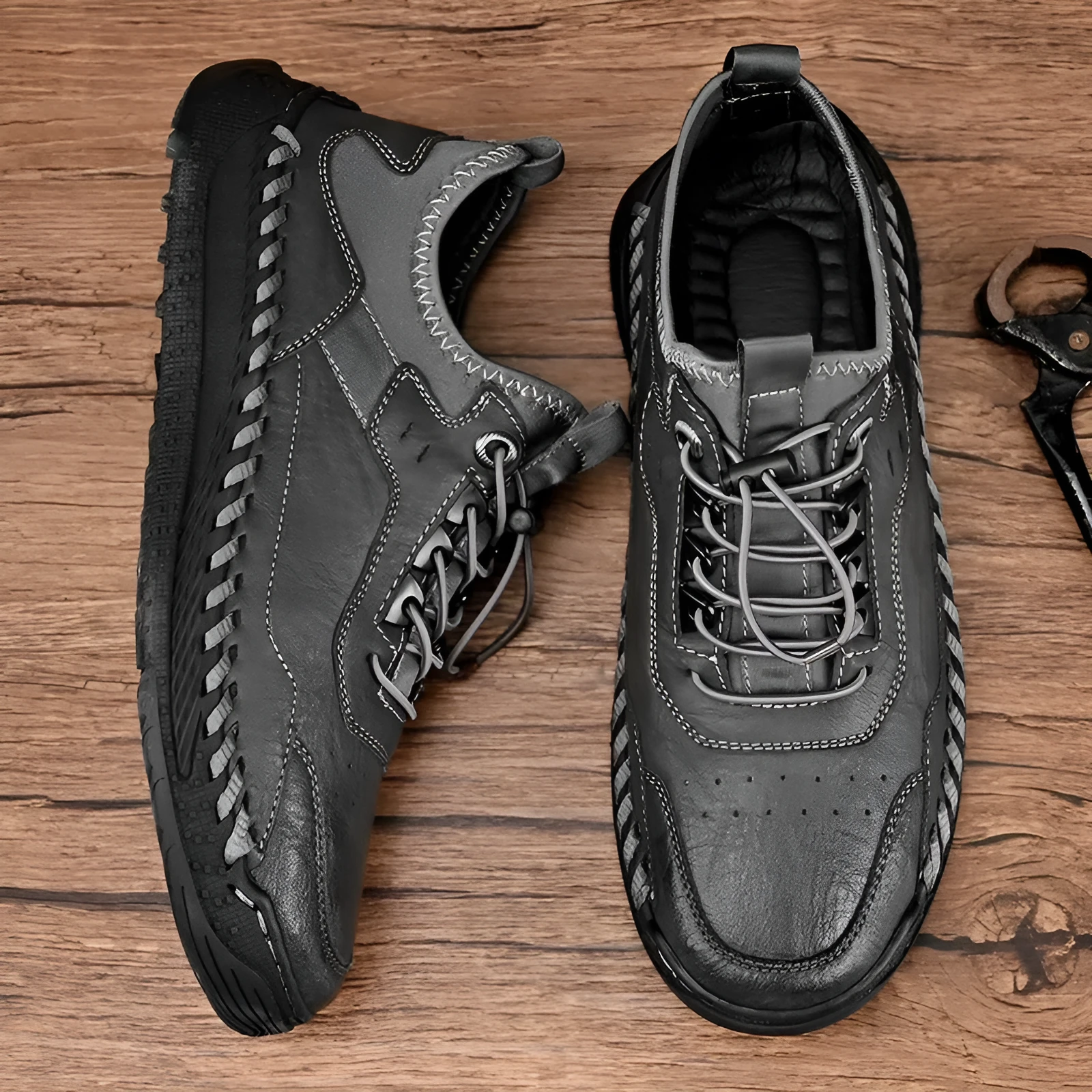 Men's hand-stitched round toe sneakers in black synthetic PU, low heel 1-3 cm, lace-up closure, side view