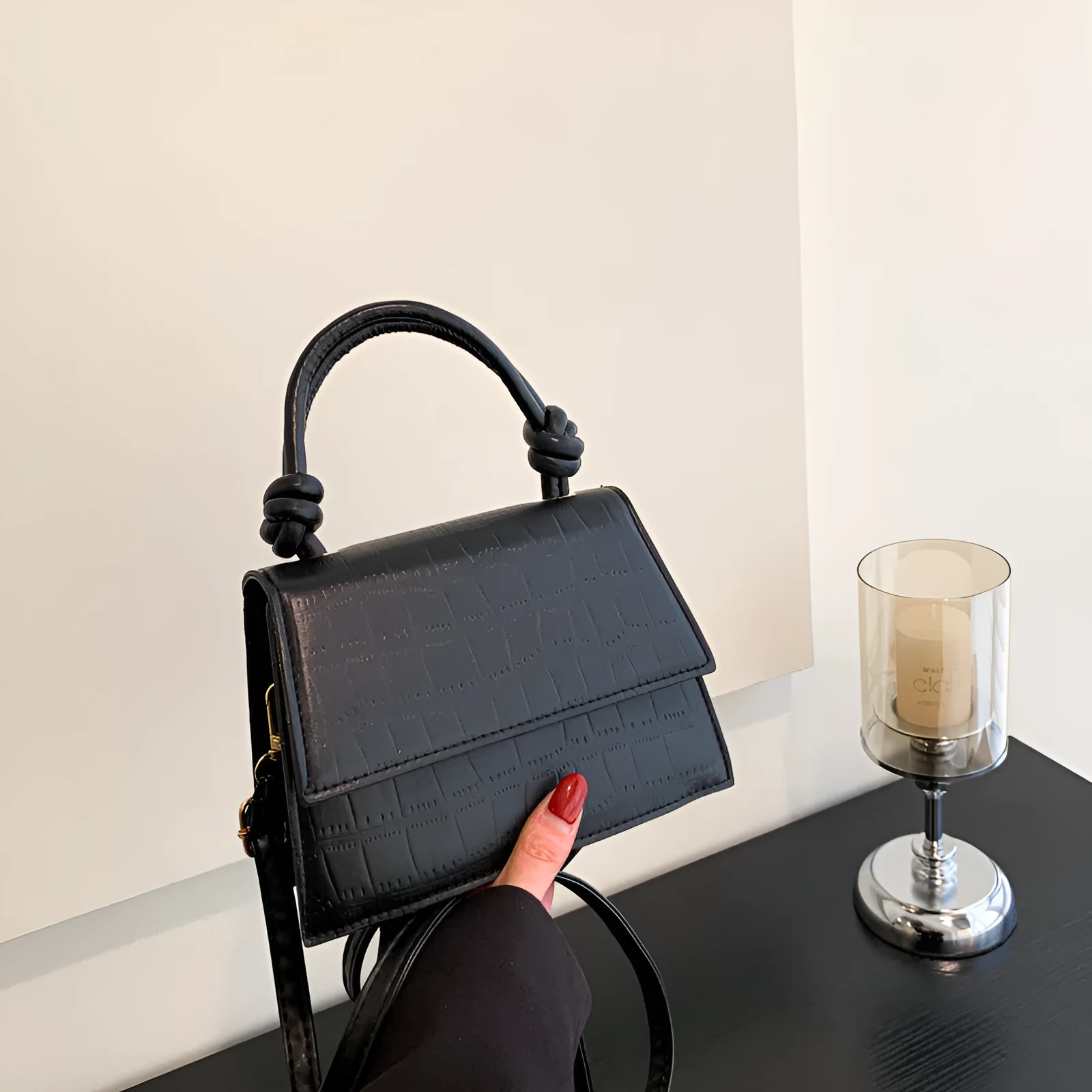 Women's soft PU underarm bag in horizontal rectangle shape with stitched seams and single shoulder strap
