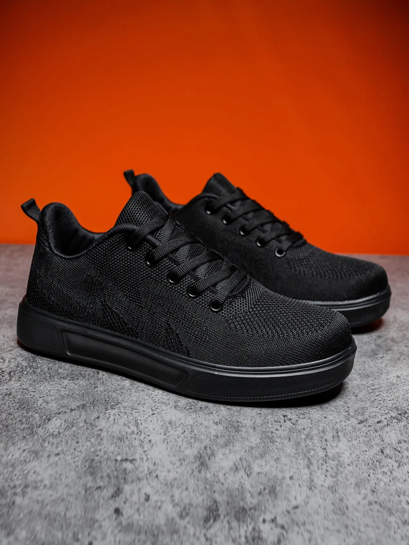 White casual sports shoes with thick EVA sole and mesh upper, flat heel, round toe, front lace-up closure