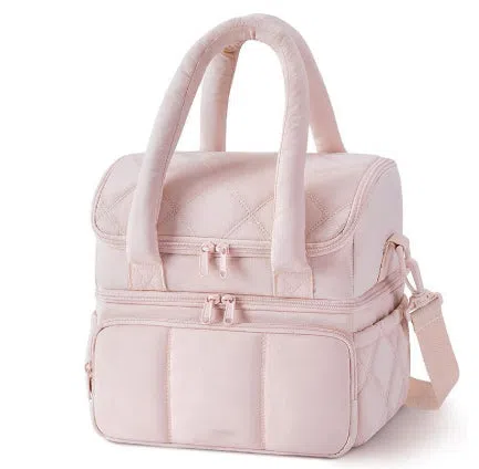 Double-layer insulated quilted pufferfish lunch bag in pink with curved shoulder straps and patchwork details