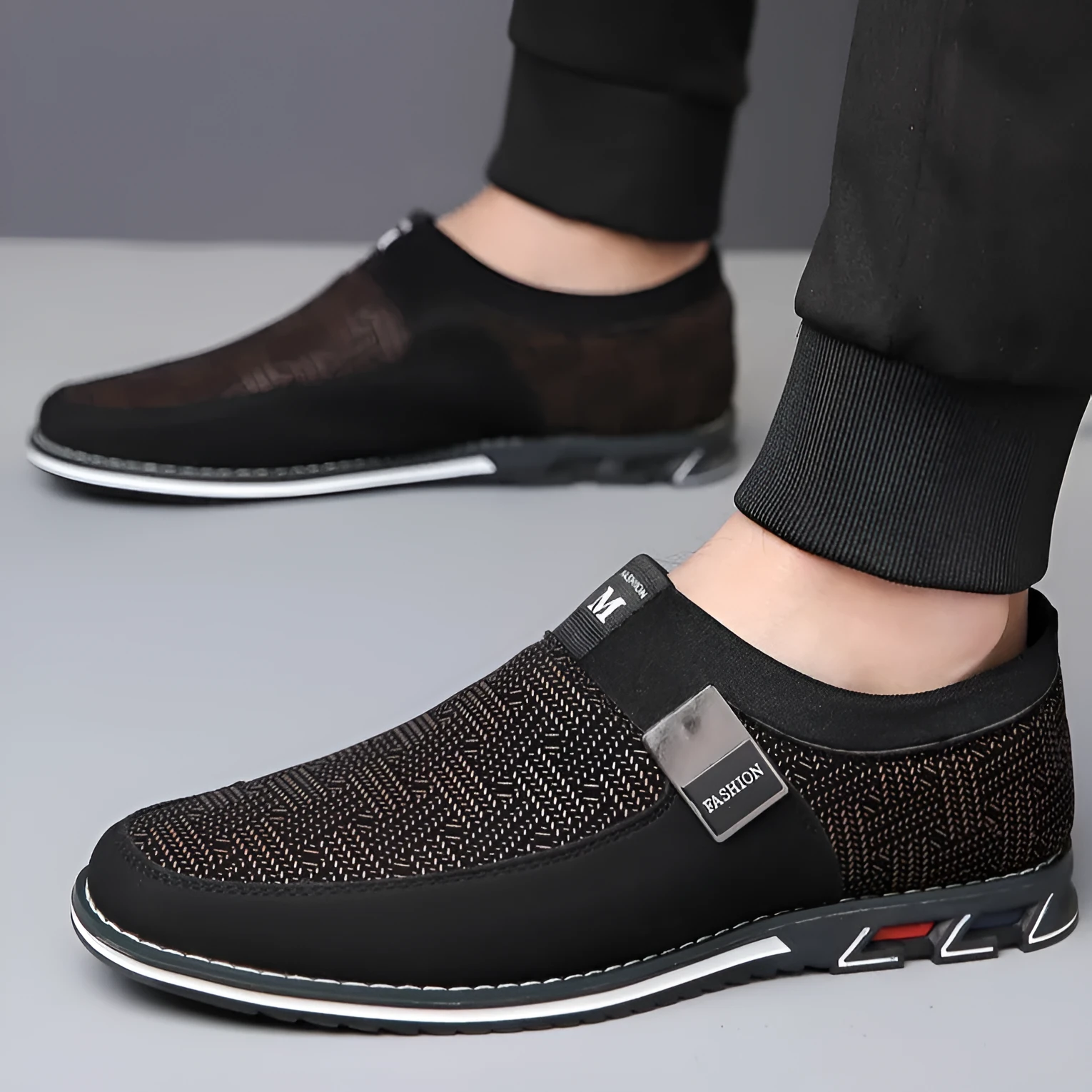 Men's synthetic leather casual shoes in black with a square toe and flat rubber sole.