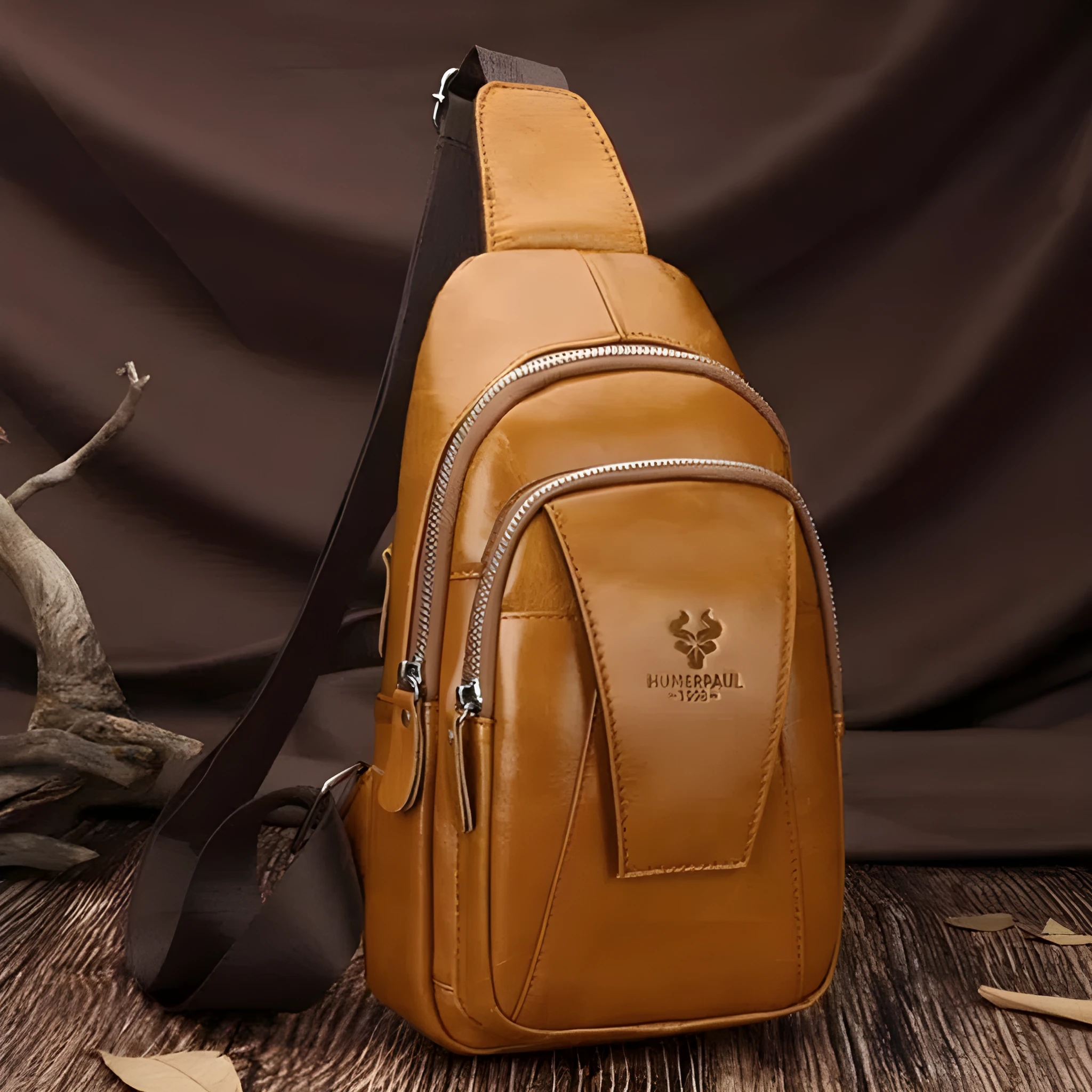 Men's full-grain cowhide single-shoulder bag in dark brown with stitched detailing and solid colour finish