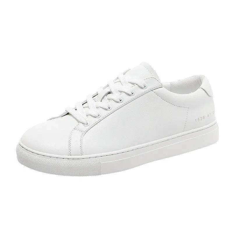 White flat-soled cowhide sneakers with stitching detail and round toe