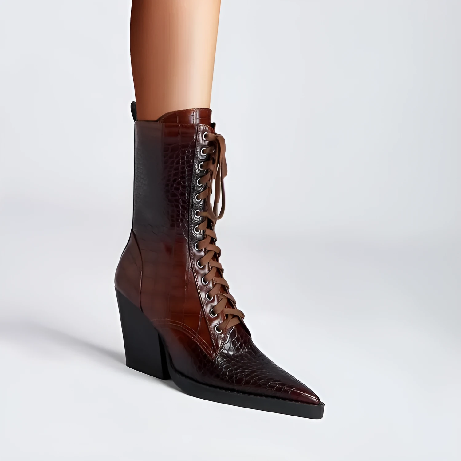 Dark brown women's pointed toe boots with chunky heel and side zip.