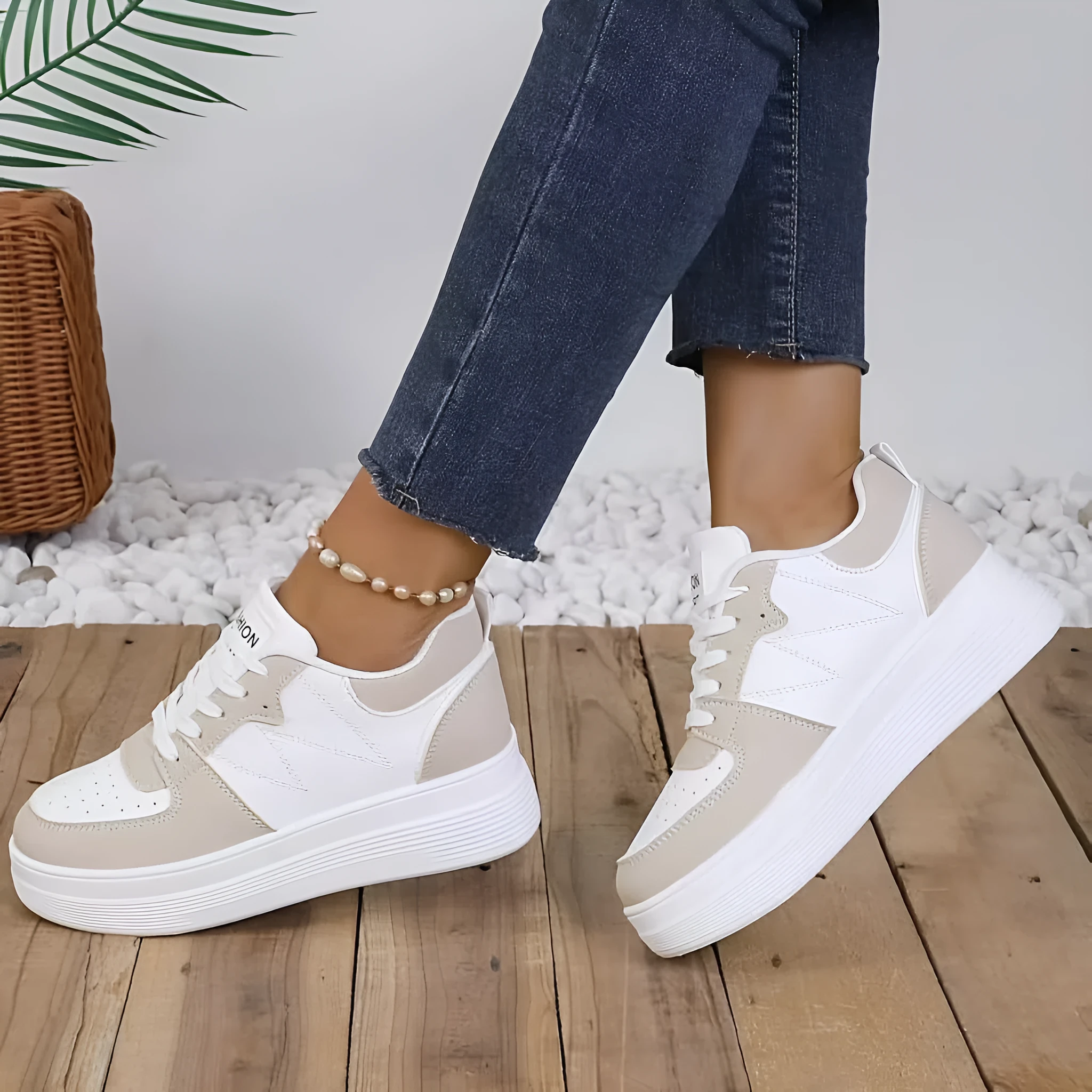 Children's low-top lace-up sneakers in white with canvas upper and thick sole, side view