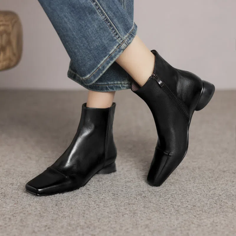 Women's cowhide leather square toe boot with side zipper and chunky heel in black
