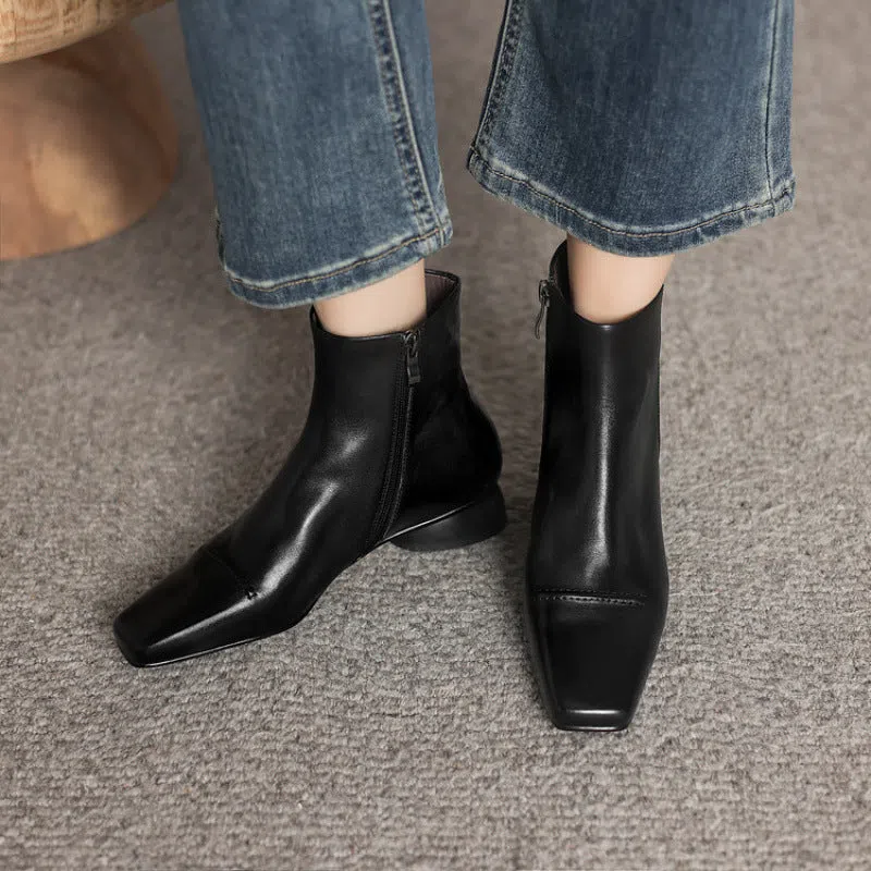 Women's cowhide leather square toe boot with side zipper and chunky heel in black