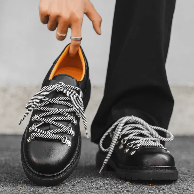 Men's outdoor casual shoes with rubber sole, striped pattern, and round toe in black colour