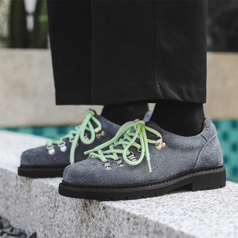 Men's outdoor casual shoes with rubber sole, striped pattern, and round toe in black colour
