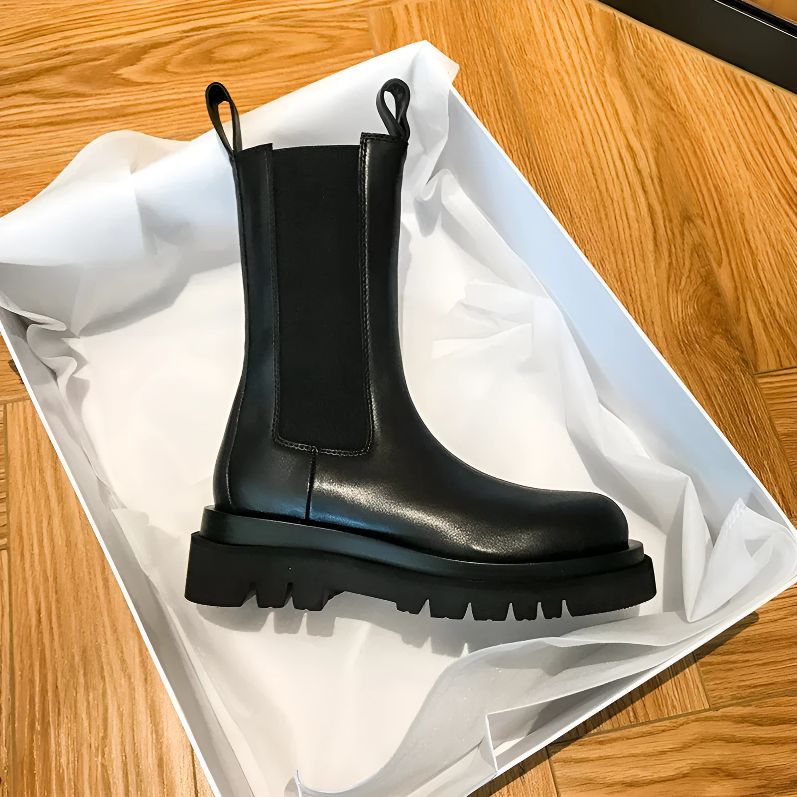 Women's black mid-calf boots with chunky low heel, round toe, and wear-resistant rubber sole in British style
