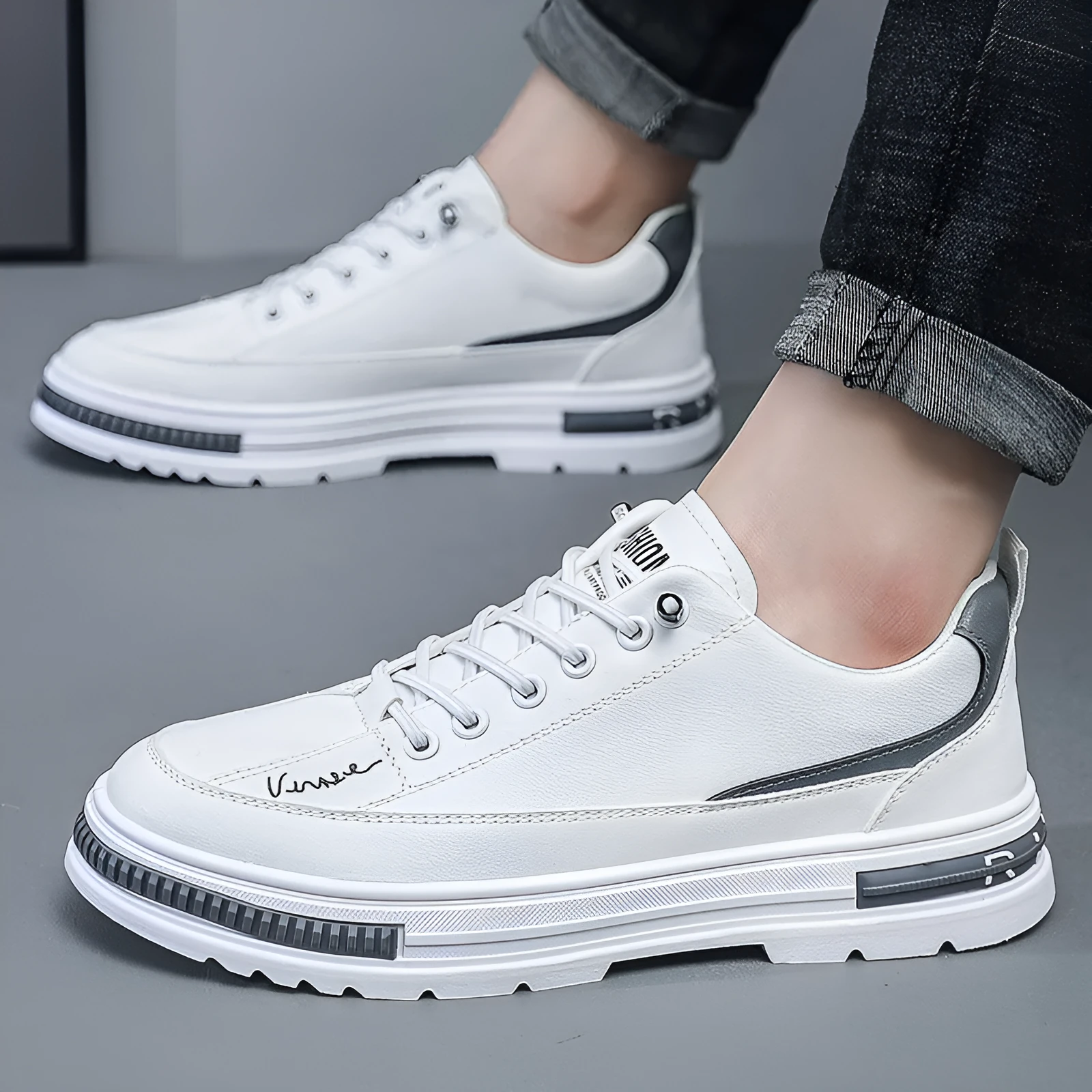 Men's white and black Korean style low-top platform sneakers with elastic band and round toe.
